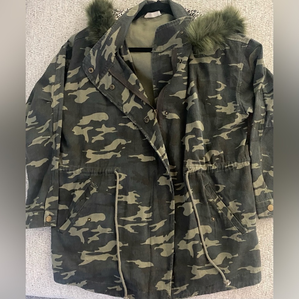 Hummingbird camouflage utility jacket with animal print hood.